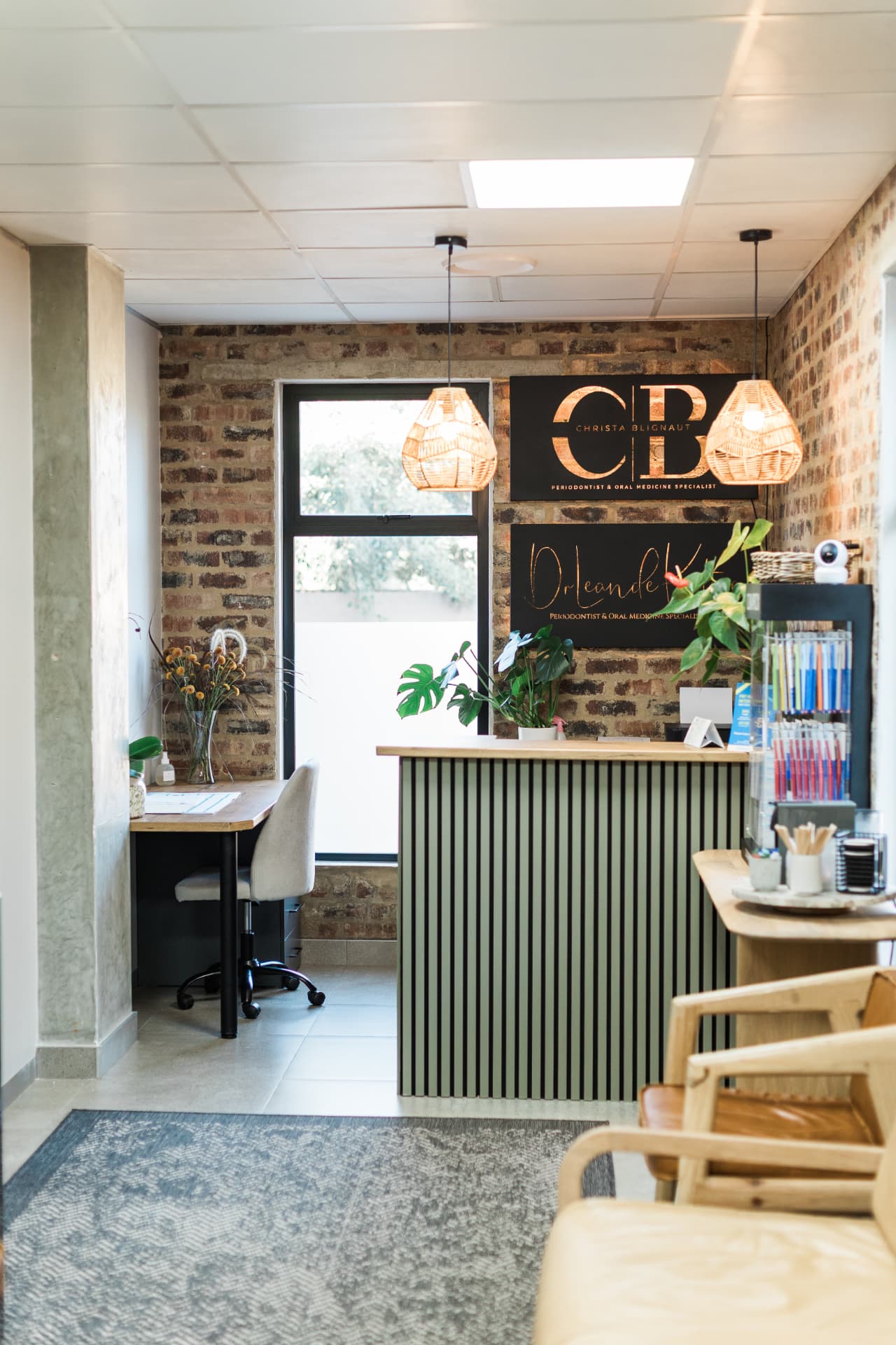 Reception and waiting area of Dr. Christa Blignaut's periodontal practice in Waterkloof Glen, Pretoria